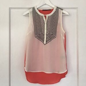 Cute cream/orange top with black embroidery design
